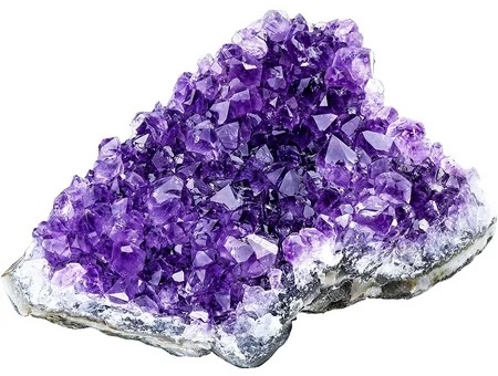 Purple points of amethyst in a rough stone